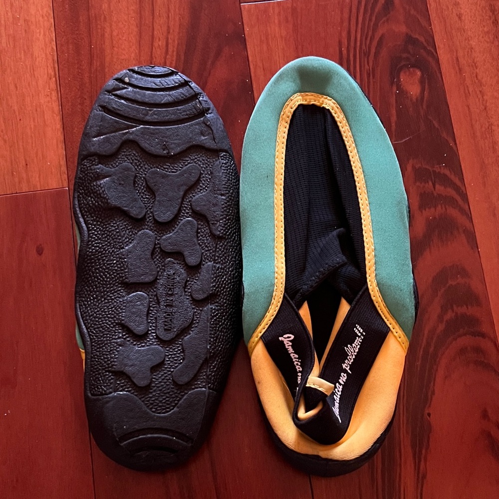 Green and Yellow swimming shoes.